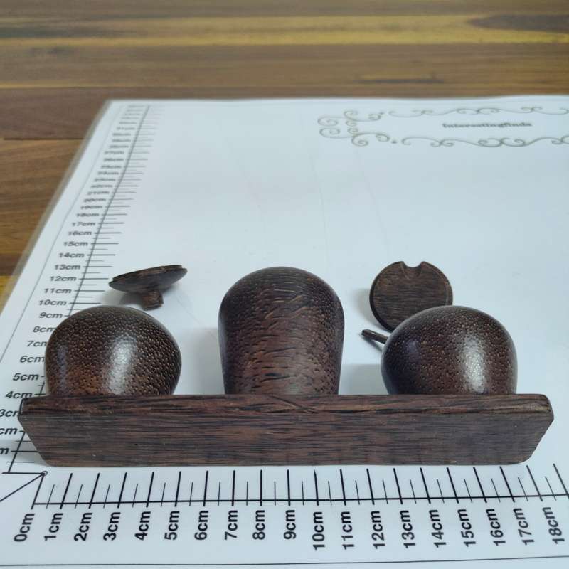 Dark wooden condiment set