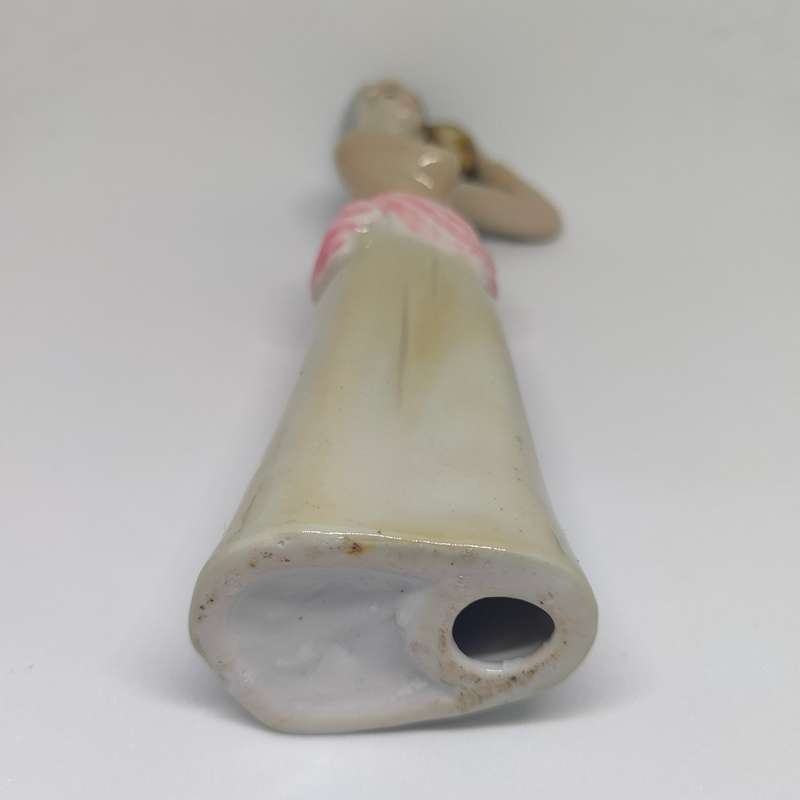 Peasant woman ceramic/porcelain figurine