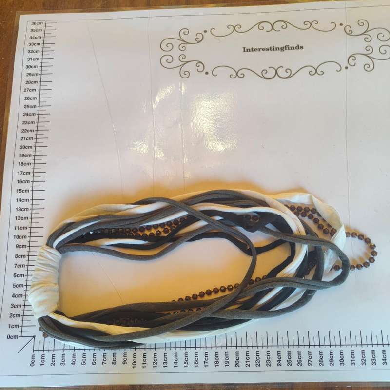 Black and white scarf like necklace with beads