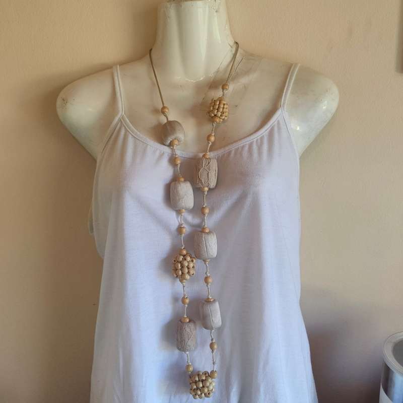 Interesting rope necklace with big cloth covered beads