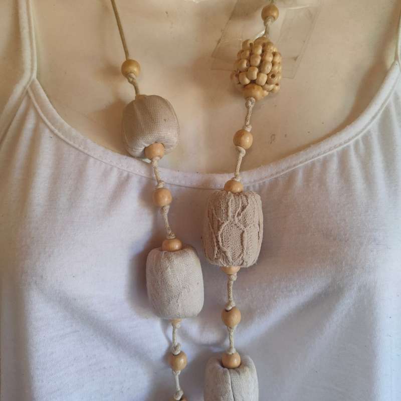 Interesting rope necklace with big cloth covered beads