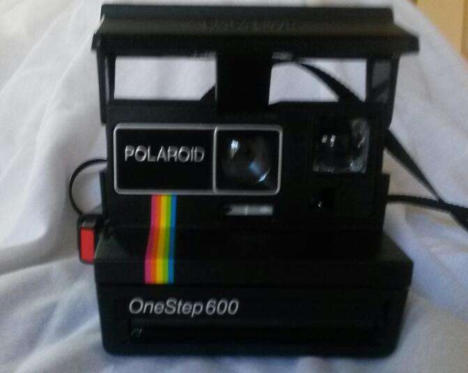 Vintage Polaroid Onestep 600 Camera in excellent cosmetic condition