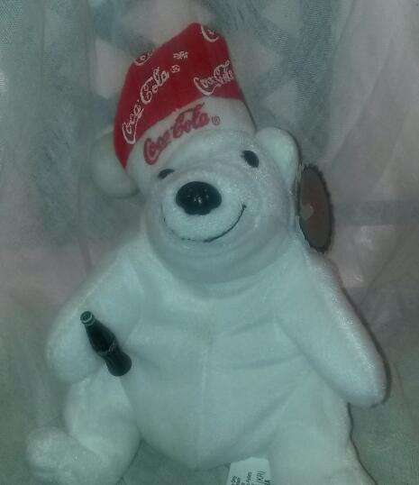 Very collectable!  Coca-cola Bean Bag Plush.  So pretty! With tags!