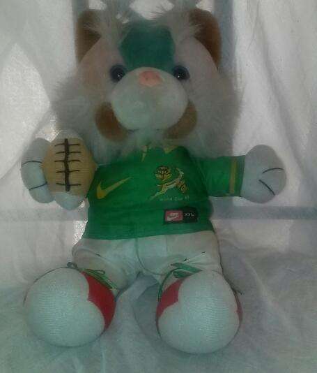Very collectable! SA Rugby 1999 plush doll. Rugby and Nike memorobilia!