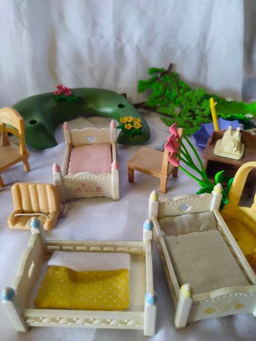 Big lot of original Sylvanian families furniture and outside playset