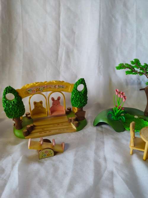 Big lot of original Sylvanian families furniture and outside playset