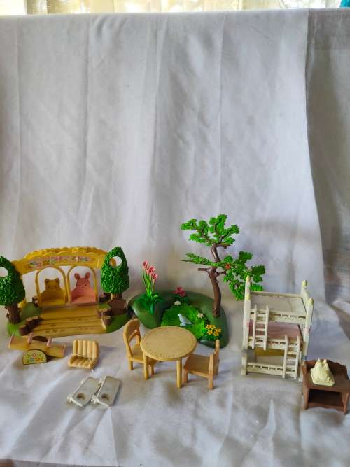 Big lot of original Sylvanian families furniture and outside playset
