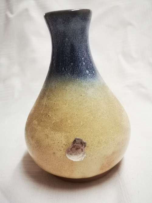 Beautiful vase with an art potteries sticker on - I don`t know who the artist is