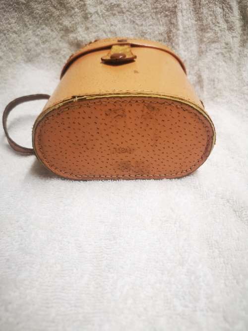 Vintage Plano binoculars 10x30 in original casing.