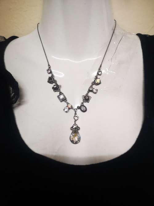Lovely charm necklace on auction