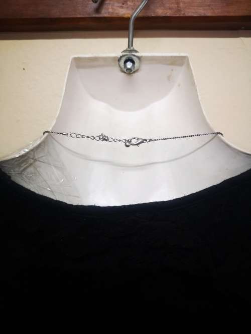 Lovely charm necklace on auction
