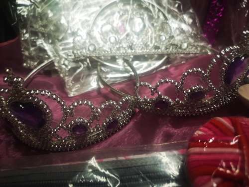 Big lot of girly goodies, includes tiaras, pink swords, pencil bag (never used) and more...