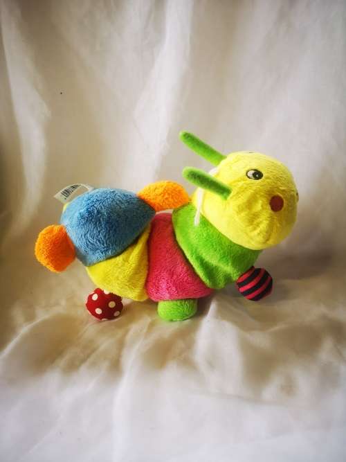 A beautiful and colorful caterpillar soft toy - perfect baby toy!
