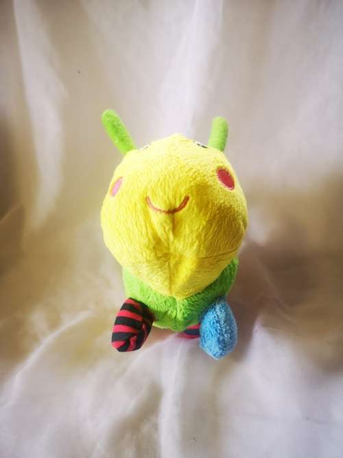 A beautiful and colorful caterpillar soft toy - perfect baby toy!