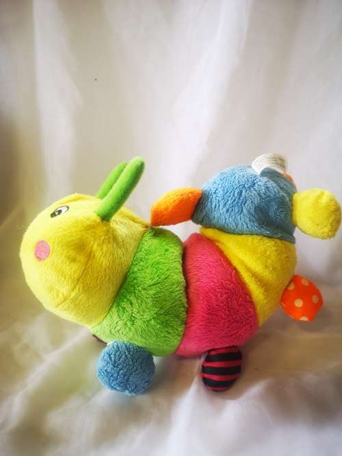 A beautiful and colorful caterpillar soft toy - perfect baby toy!