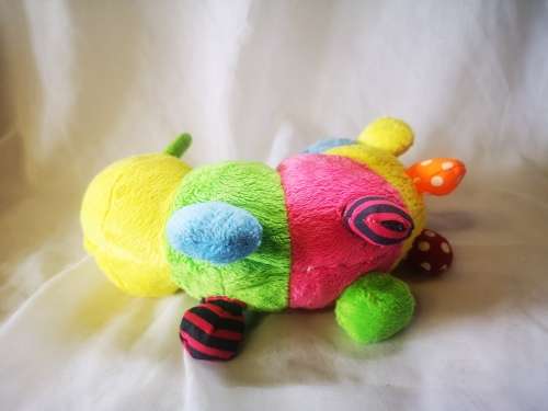 A beautiful and colorful caterpillar soft toy - perfect baby toy!