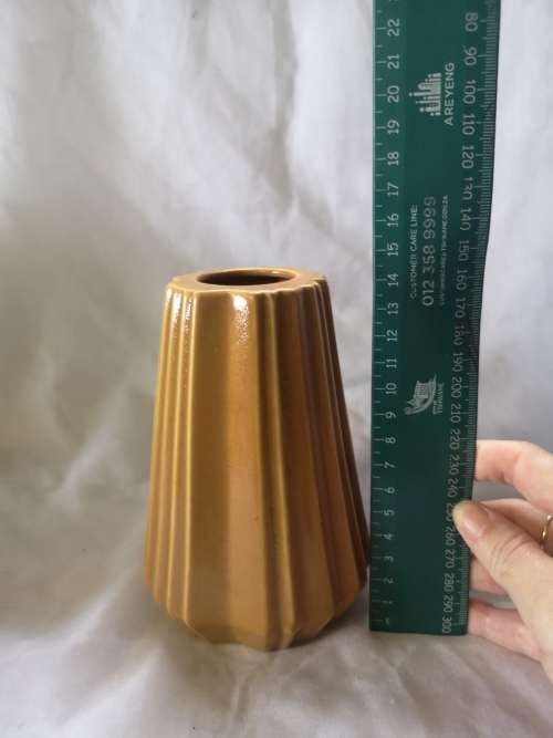 A beautiful vintage ceramic vase on offer