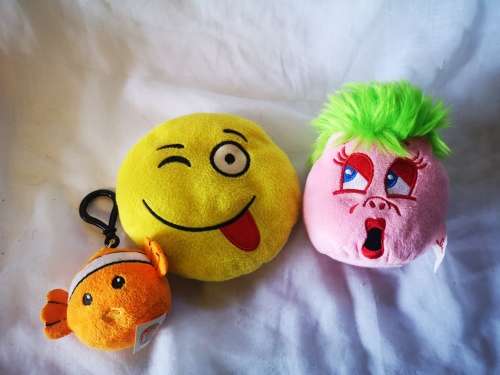 Three cute little plush toys - a pillow, a beanie toy and a key holder.