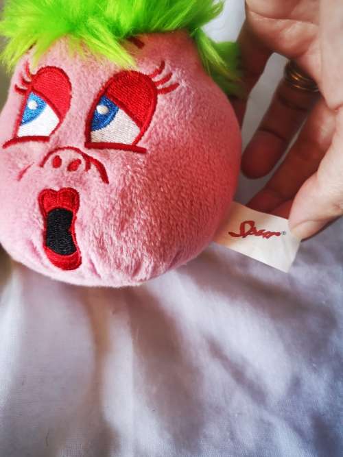 Three cute little plush toys - a pillow, a beanie toy and a key holder.
