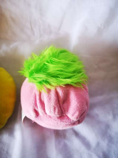 Three cute little plush toys - a pillow, a beanie toy and a key holder.