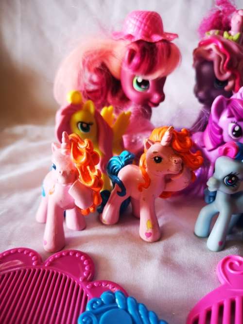 A lovely lot of genuine my little ponies and hair brushes/combs