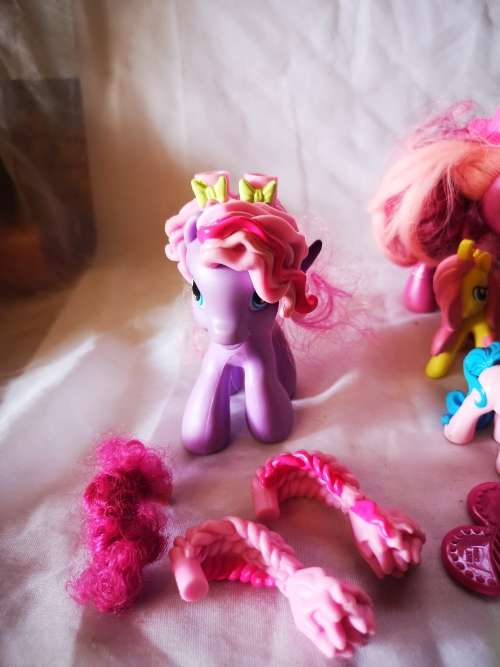 A lovely lot of genuine my little ponies and hair brushes/combs