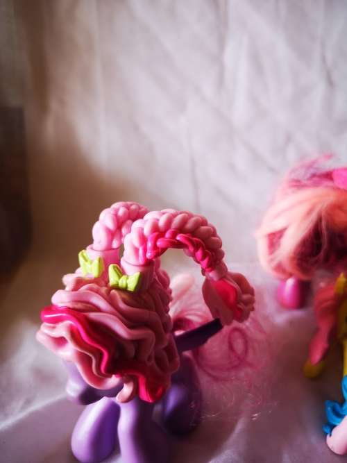 A lovely lot of genuine my little ponies and hair brushes/combs