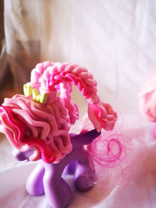 A lovely lot of genuine my little ponies and hair brushes/combs