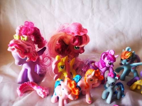 A lovely lot of genuine my little ponies and hair brushes/combs