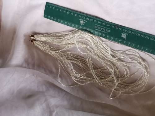 Lovely multi-strand white beaded necklace on offer.