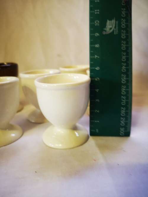 Marked down! Lot of 7 egg cups on offer