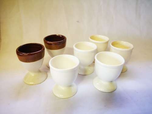 Marked down! Lot of 7 egg cups on offer