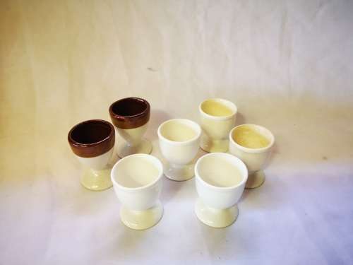 Marked down! Lot of 7 egg cups on offer