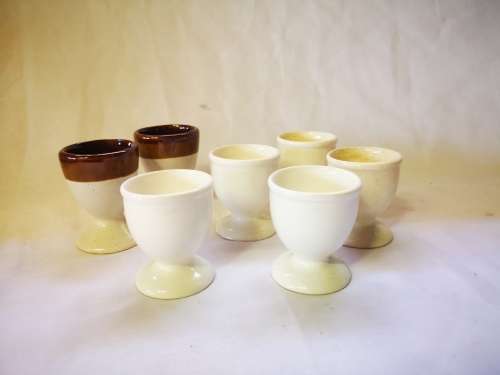 Marked down! Lot of 7 egg cups on offer