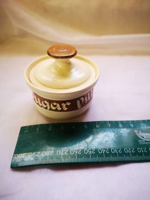 A beautiful sugar pot on auction.