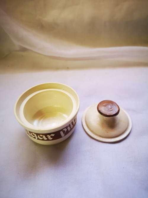 A beautiful sugar pot on auction.
