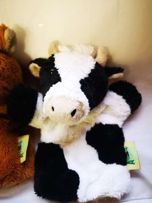 Three "animal planet" hand puppets on auction