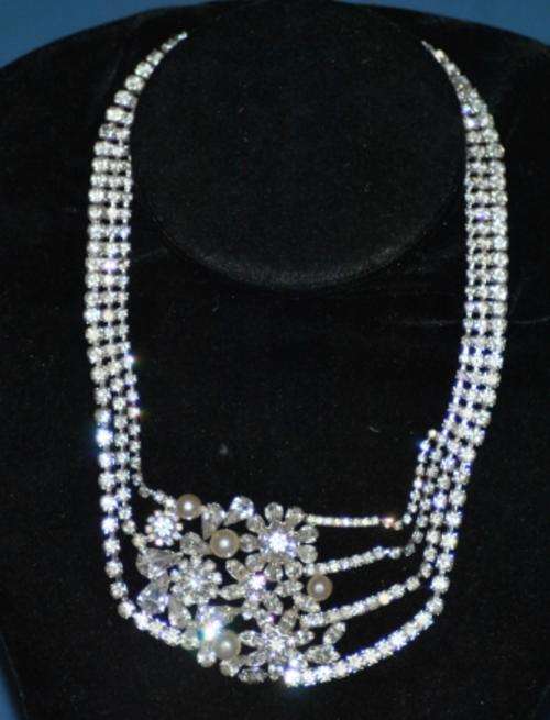 Silver metal with Chech crystals and faux pearl necklace