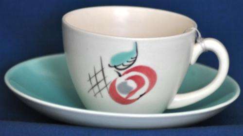Poole Pottery "apple" coffee cup and saucer