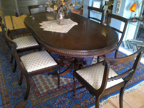 8 Seater table with dropleaves and 8 chairs