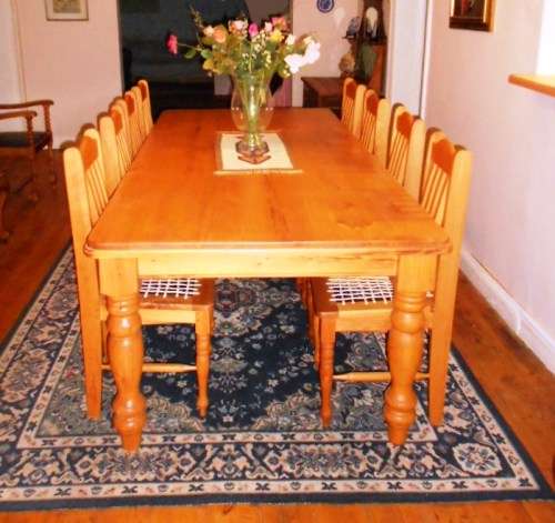 Yellow Wood 10 seater Dinning table and 8 yellow wood & riempie chairs