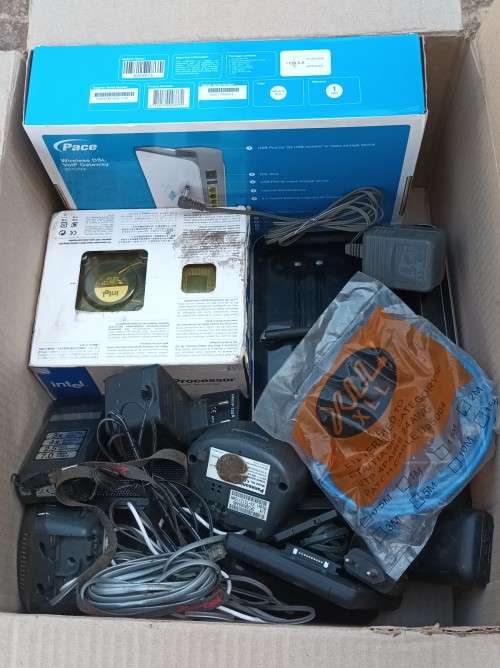 Box of electronics 2xRouters, wireless phones, hand cam,  CPU, cooling pad wires and so on