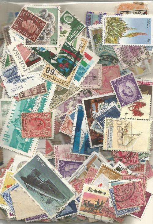 MIXED WORLD    USED   LOT IN PKT, .40 .GS