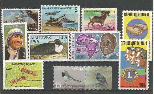 MIXED WORLD UN MOUNTED MINT SETS & PART SETS