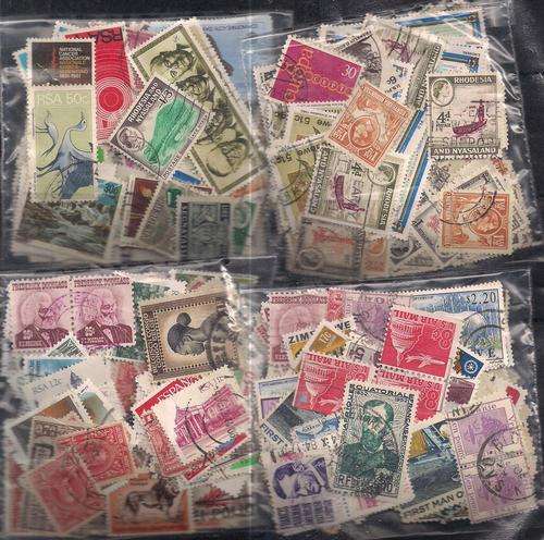 MIXED WORLD USED LOT IN PKTS SOME DOUBLES