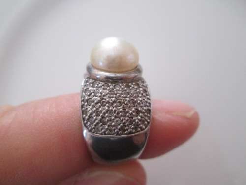 VERY PRETTY STERLING SILVER RING WITH PEARL AND DIAMONDS OR CUBICSECONIA NOT SURE
