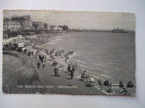VINTAGE POSTCARD  BEACH EASTBOURNE WITH 2 STAMPS