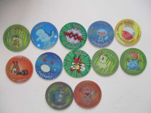 10 POKEMON TAZOS  AND 2  3D POKEMON TAZOS  -  12 PIECES