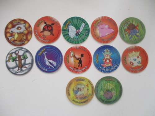 10 POKEMON TAZOS  AND 2 3D POKEMON TAZOS  - 12 PIECES