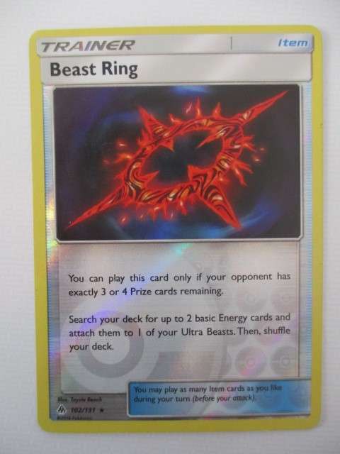 POKEMON - HOLOGRAPHIC FOIL CARD - BEAST RING TRAINER